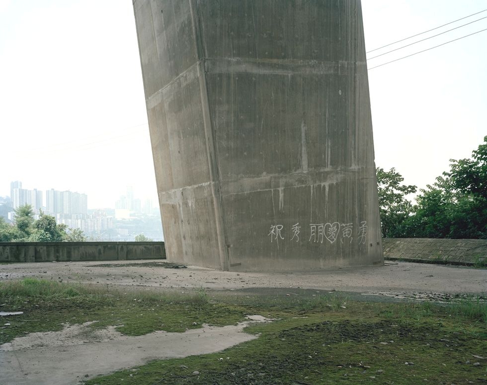 "Zhu Xiuli loves Huang Yong," a love manifesto under the Yangtze River Bridge, Chongqing. (Bo Wang)