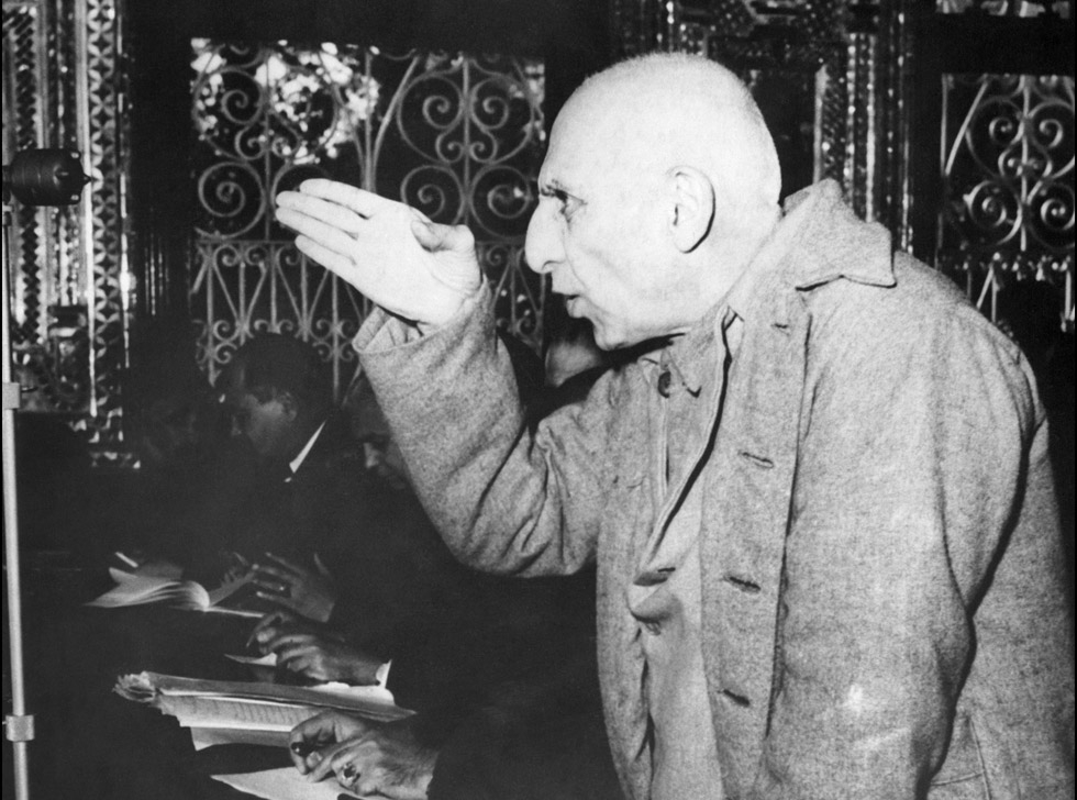 Picture dated 20 November 1953 of Iranian ex-Premier Mohammed Mossadegh using his hand to make a point during one of his frequent interruptions of court proceedings in Tehran's military tribunal, trying him for treason. (STF/AFP/Getty Images)