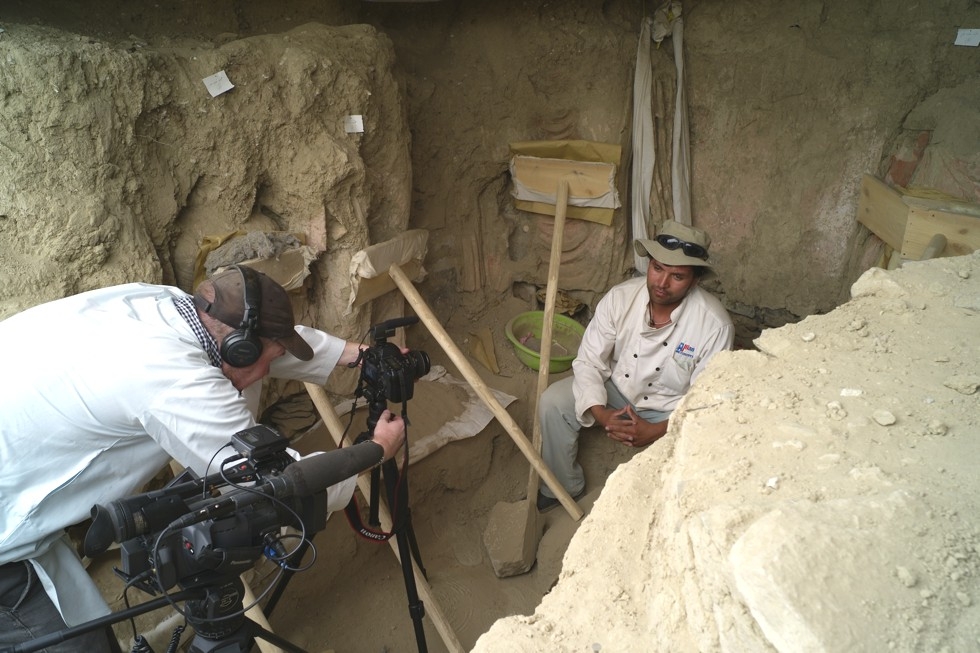 Brent Huffman interviewing lead Afghan archaeologist Abdul Qadeer Temore. (Frank Petrella)