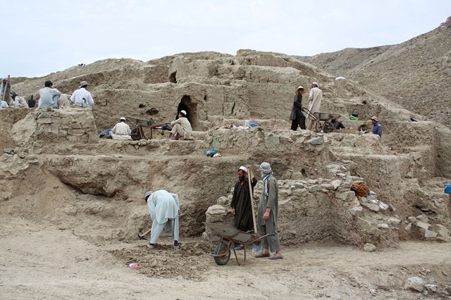 Workers excavate a 2,000-year-old archaeological site discovered in Mes Aynak, Afghanistan in August 2010. (Joanie Meharry)