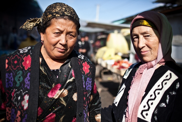 Two Krygyz traders pose for a portrait in Jalalabad Bazaar. (Sue Anne Tay)