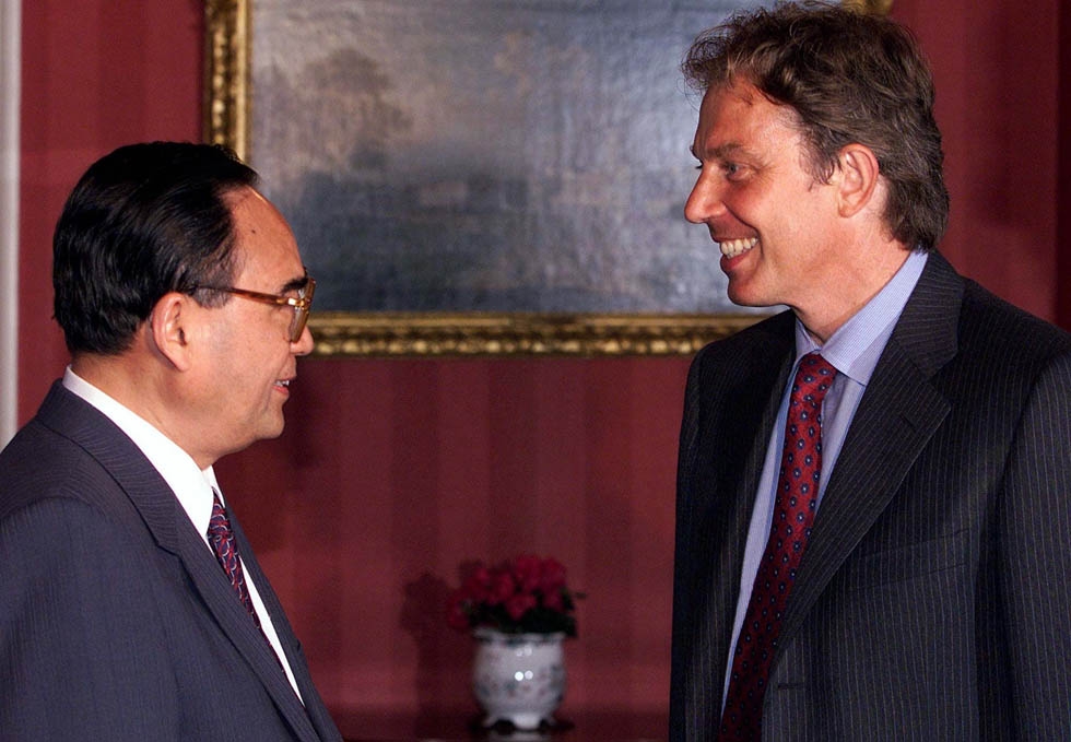 British Prime Minister Tony Blair (R) meets with Chinese Politburo representative Ding Guan'gen at 10 Downing Street on September 6, 1999. Ding passed away on July 22. (Ian Waldie/AFP/Getty Images)