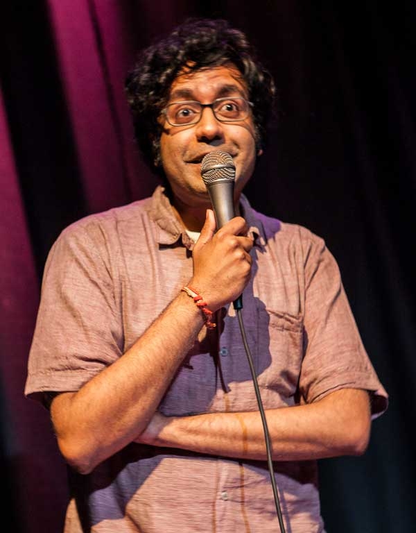 Comedian Hari Kondabolu onstage at the Nuyorican Poets Cafe on August 12, 2012. (Neha Gautam Photography)