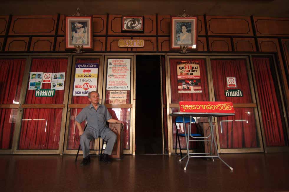 This ticket taker has been doing his job for more than 20 years at the Nakon Non Rama Theater in Nonthaburi, Thailand. (Philip Jablon)