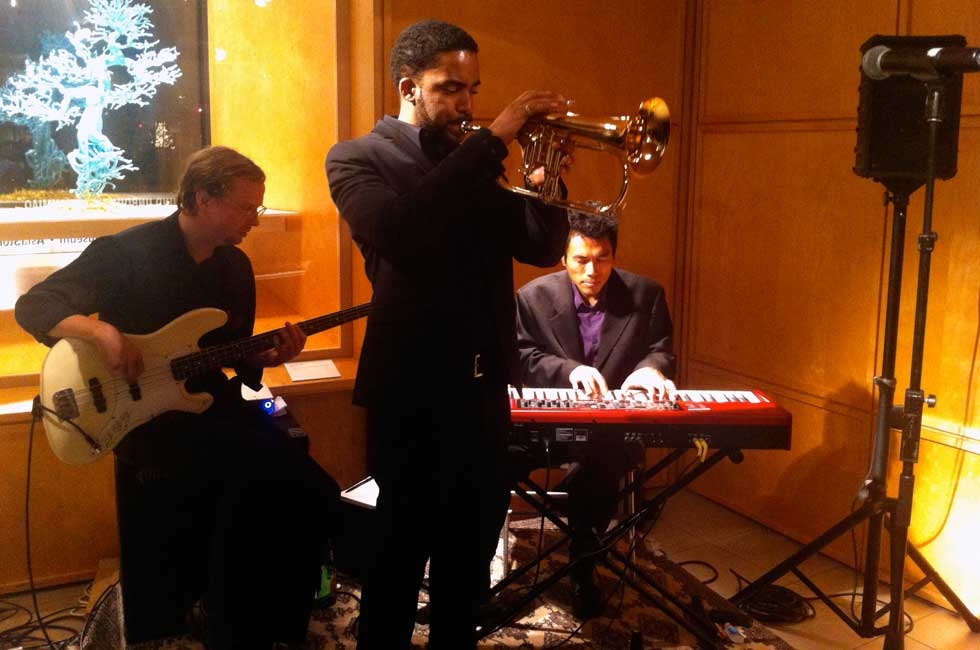 L to R: A jazz trio comprised of Jon Price (bass), Jean Caze (trumpet), and A J Khaw (piano) kept a steady groove going during the party. (Asia Society)