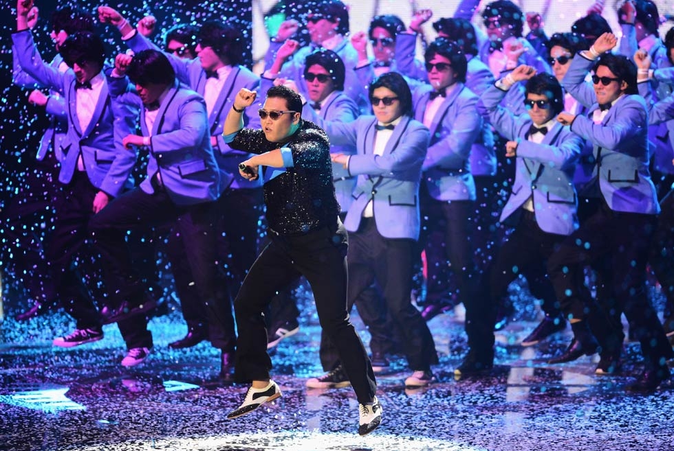 South Korean musician Psy released a video of his song "Gangnam Style" in July 2012 which gained immediate worldwide popularity. Psy performed his famous galloping dance moves in Frankfurt am Main, Germany, on November 11, 2012. (Ian Gavan/Getty Images for MTV)