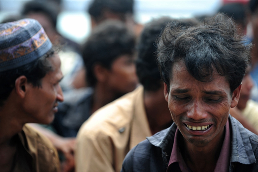 Sectarian violence and revenge attacks broke out between Buddhists and Muslims in Myanmar's Rakhine state in June. These refugees were trying to enter Teknaf, Bangladesh on June 18, 2012. (Munir uz Zaman/AFP/Getty Images)