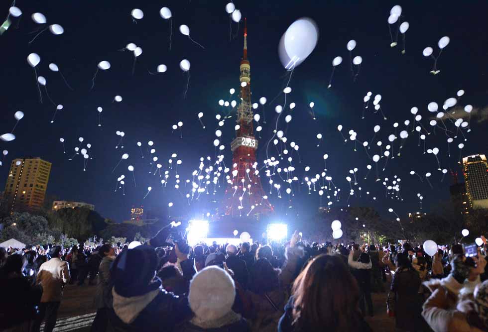 People release balloons to celebrate the New Year during an annual countdown ceremony in Tokyo, Japan on January 1, 2013. (Kazuhiro Nogi/AFP/Getty Images)