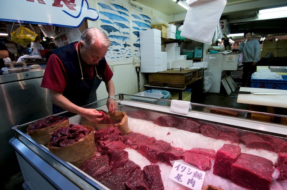 Butcher sorts meat from whales killed by Japanese whaling boats in Tokyo's Tsukiji Fish Market in June 2010. (Shawn Heinrichs/Blue Sphere Media)