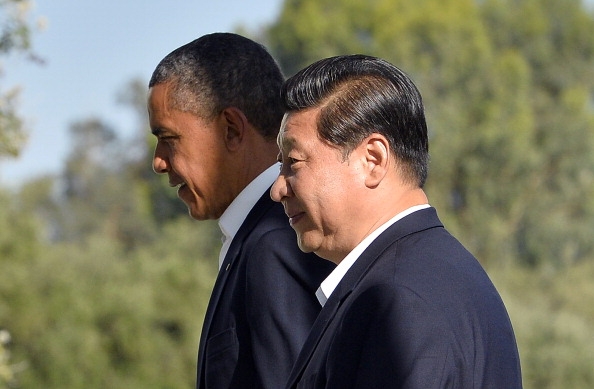 U.S. President Barack Obama and Chinese President Xi Jinping head for a bilateral meeting at the Annenberg Retreat at Sunnylands in Rancho Mirage, California, on June 7, 2013. (Jewel Samad/Getty Images)