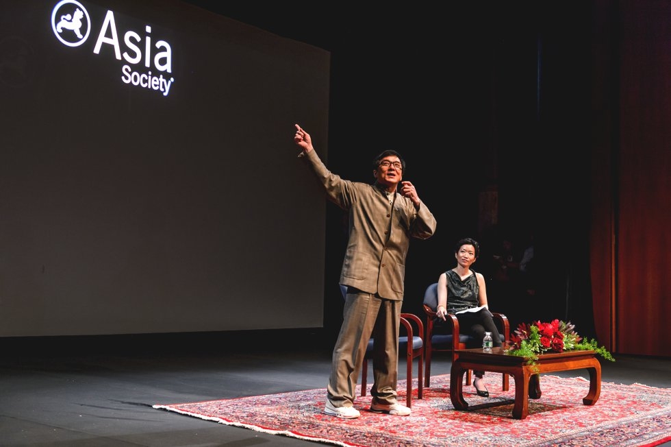 Jackie Chan speaks with La Frances Hui at Asia Society headquarters in New York. (C. Bay Milin/Asia Society)