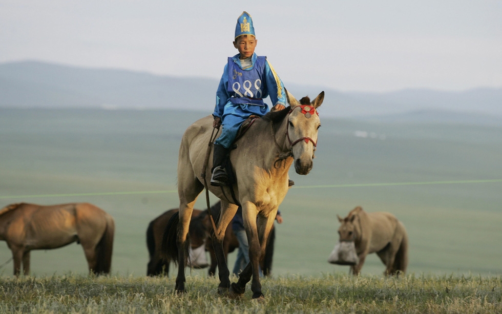 Another rider prepares for a horse race during the annual Naadam Festival at Khui Doloon Khudag 40 km from Ulaanbaatar. (Peter Parks/AFP/Getty Images)