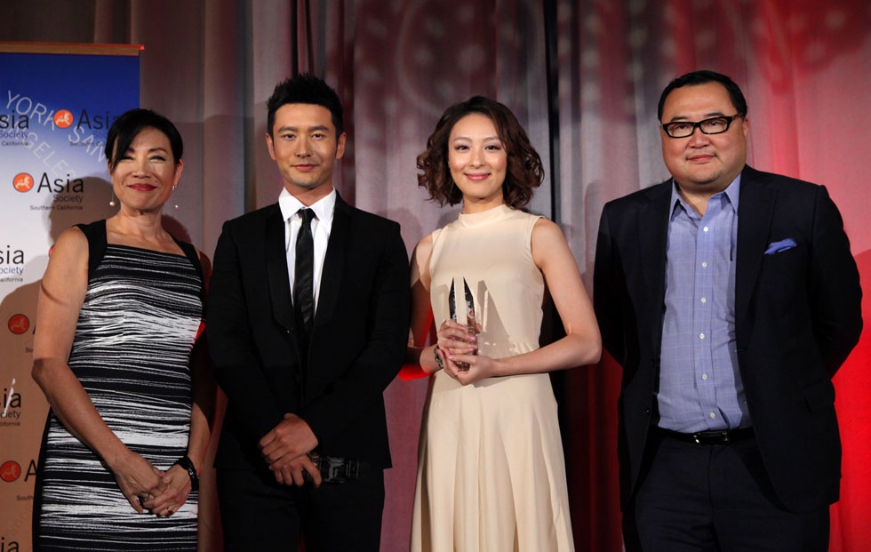 L to R: film producer/entertainment media consultant Janet Yang; actor Huang Xiaoming; actress Sarah Li; and Bruno Wu, chairman and CEO of Seven Stars Entertainment and Media, at the 2014 Asia Society U.S.-China Film Summit and Gala,  held at the Millennium Biltmore Hotel in Los Angeles on Nov. 5, 2014. (Ryan Miller/Capture Imaging)