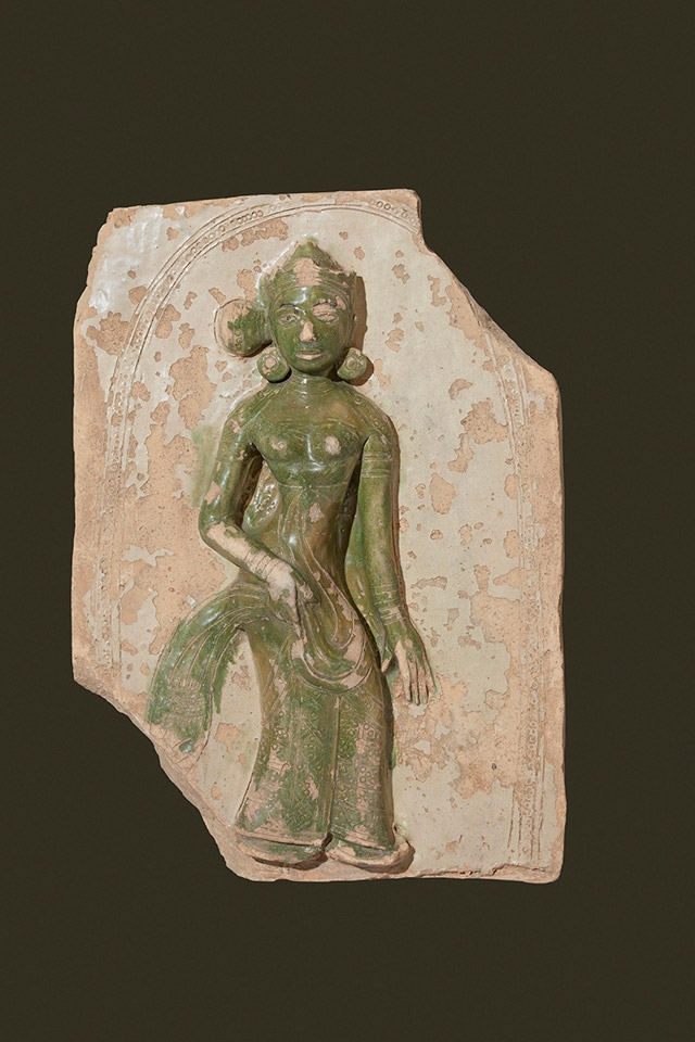 Mara’s Daughter; From Shwegugyi Temple complex, Ajapala Shrine, Pegu; Ca. 1479; Glazed terracotta; H. 18 x W. 13 x D. 4 in. (45.7 x 33 x 10.2 cm). National Museum, Nay Pyi Taw. (Sean Dungan)