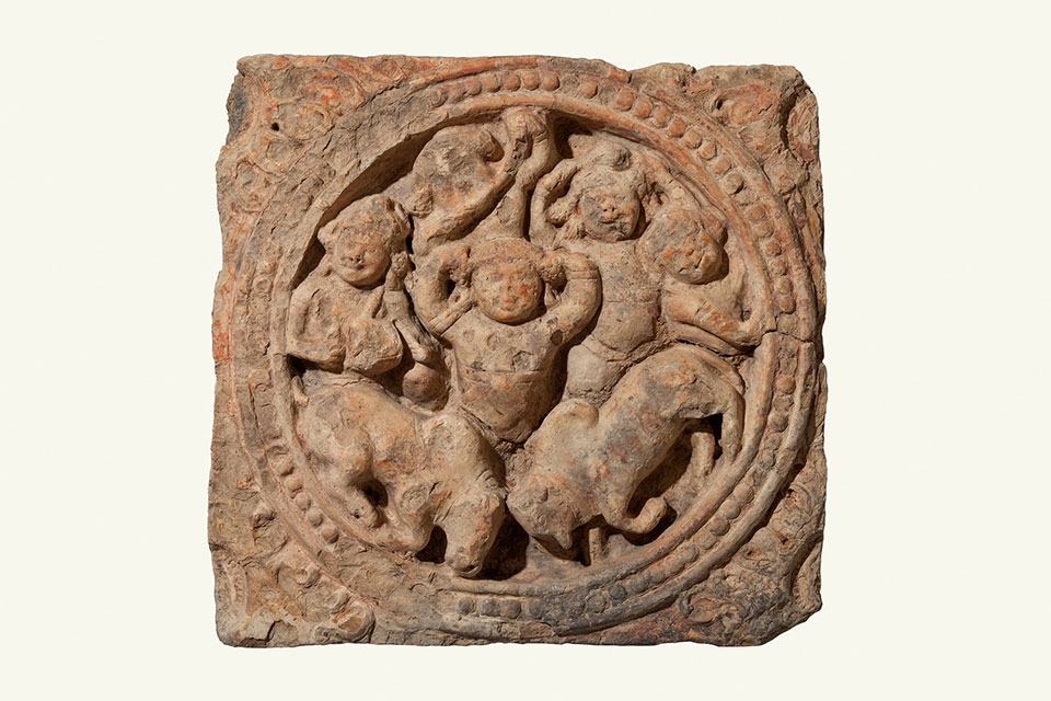 Roundel with figures; Kyontu Ca. 5th–6th century; Terracotta; H. 17 x W. 18 x D. 51/2 in. (43.2 x 45.7 x 14 cm). National Museum, Nay Pyi Taw. (Sean Dungan)