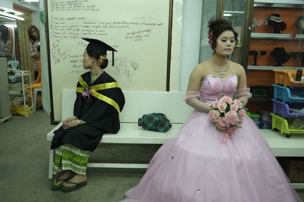 Graduate and bride at a beauty salon in Meiktila, 2013. (Geoffrey Hiller)