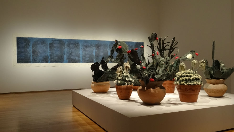 Installation view at Asia Society Texas Center of works by Zhi Lin (left) and Margarita Cabrera (right), courtesy of the artists