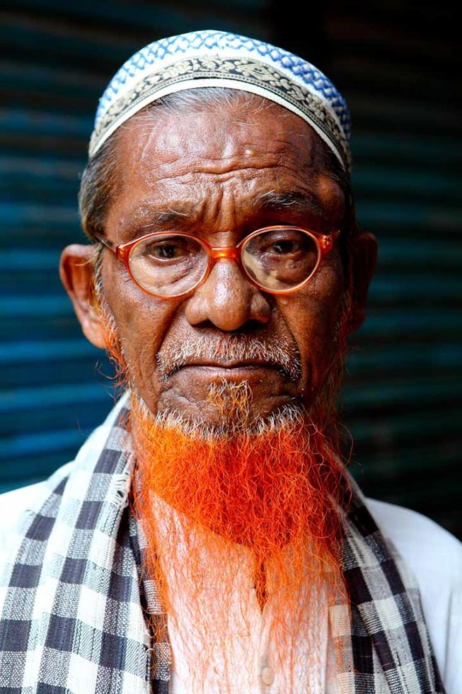 Men with orange facial hair is a common sight in Bangladesh. (GMB Akash)