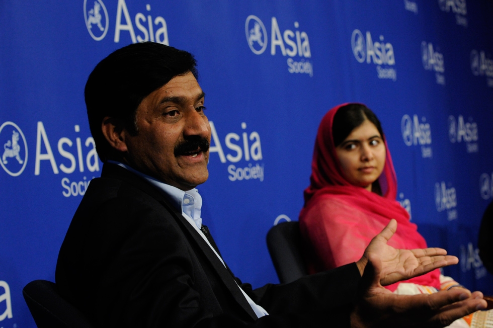 Ziauddin Yousafzai (L) and Malala Yousafzai respond to an audience question. (Elena Olivo/Asia Society)