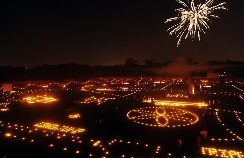 Indian residents light candles and lamps at the Madan Mohan Malviya stadium on the eve of the Hindu festival Diwali in Allahabad on October 22, 2014. (Sanjay Kanojia/AFP/Getty Images)