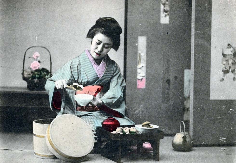 "Woman dishing rice into bowl." 1901-1907. (New York Public Library)