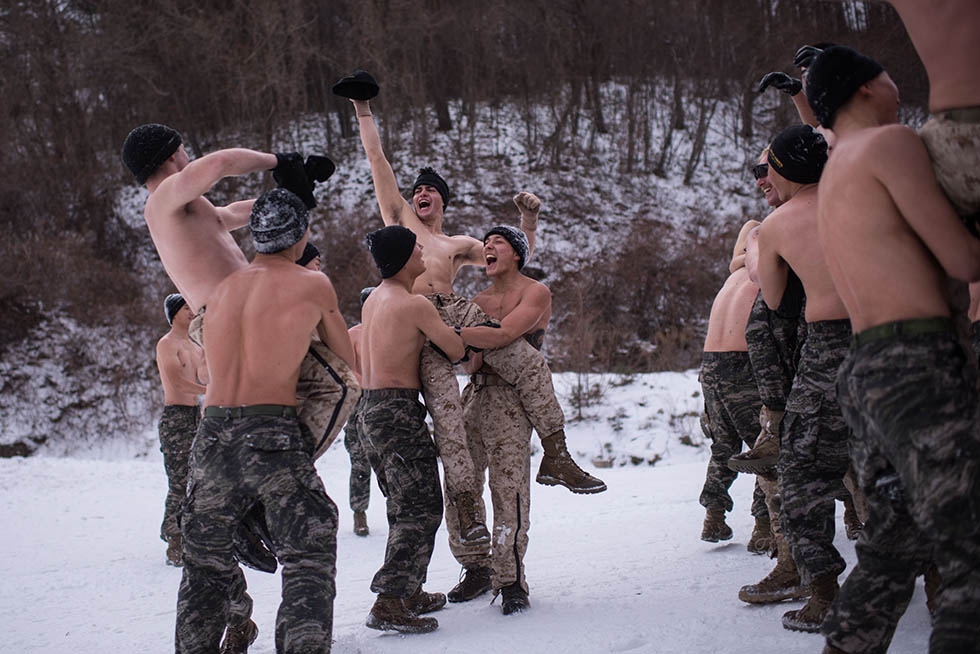 South Korean and U.S. soldiers wrestle during a joint annual winter exercise in Pyeongchang, South Korea on January 28, 2016. (Ed Jones/AFP/Getty)