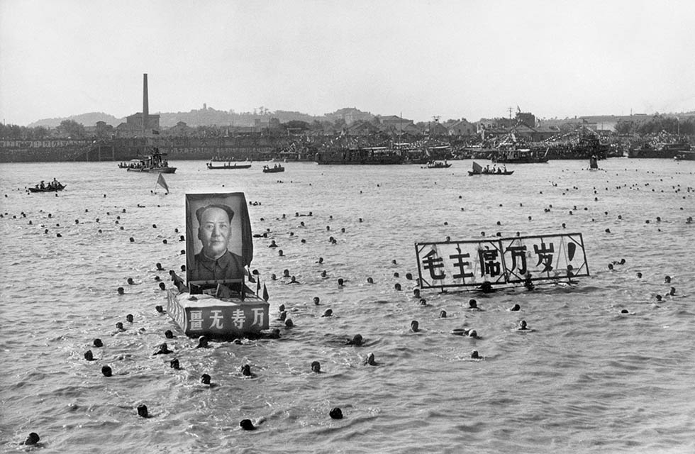 Some 5,000 Chinese follow Chairman Mao Zedong's example and swim in the Yangtze River near Wuhan in September 1967. They displayed floating portraits of Mao and slogans calling for him to "live 10,000 years." (STR/AFP/Getty Images)
