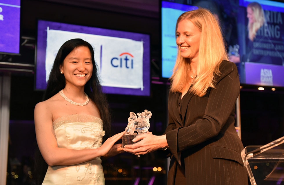 Marita Cheng is presented with her Asia Society Asia Game Changer award at the United Nations in New York on October 27, 2016. (Jamie Watts/Asia Society)