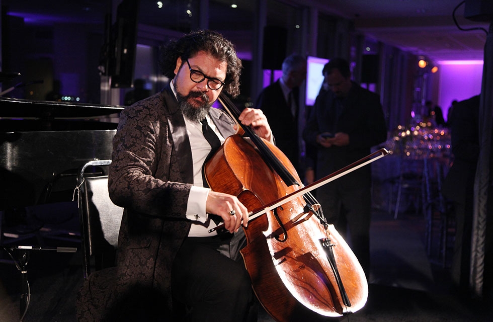 2016 Asia Game Changer and Iraqi cellist Karim Wasfi plays a moving piece at the Asia Game Changer Awards Gala at the United Nations Headquarters in New York on October 27, 2016. (Asia Society/Ellen Wallop)