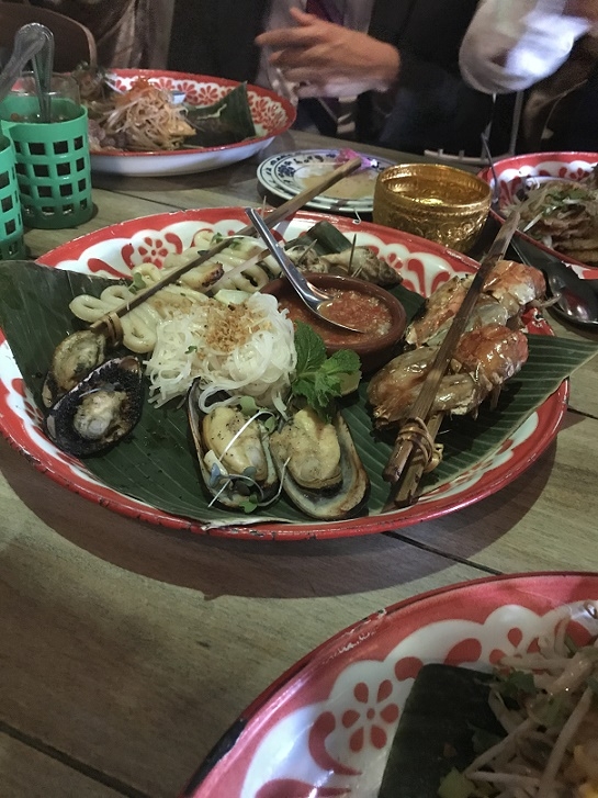 The Phi Phi Platter included mussels, prawns and calamari with garlic noodles and a spicy Thai seafood sauce. (Liza Strauss/Asia Society)
