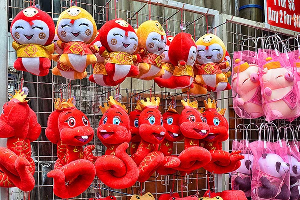 Since 2013 is the year of the snake, stalls are selling all types of snaky toys in Chinatown, Singapore on January 15, 2013. (chooyutshing/flickr)