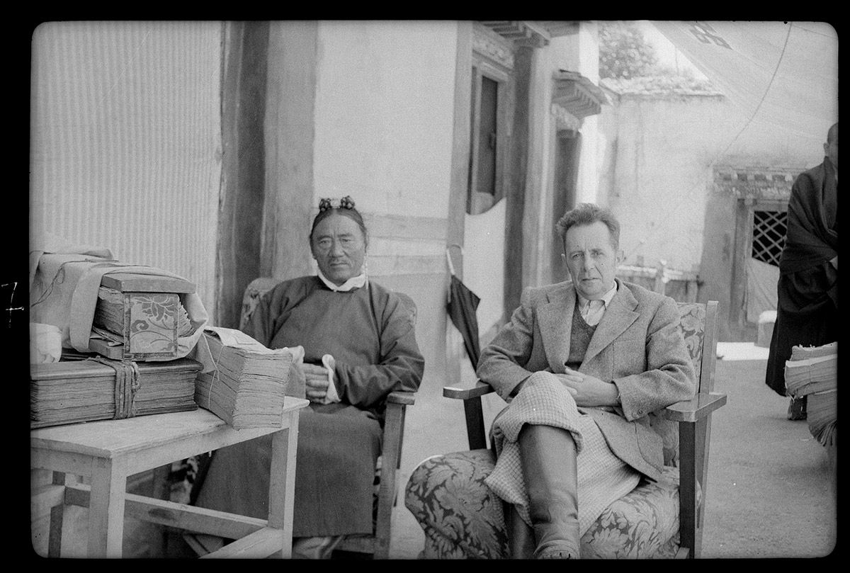 Giuseppe Tucci and Tsarong, Tibetan Minister of Finance for Chushul, August 1948. Tucci was consulting Tsarong's personal library. Lhasa, U, Tibet. (Prodhan, 1948; Neg. dep. 7014/07. Courtesy of Istituto Italiano per l'Africa e l'Oriente (Is.I.A.O.) in l.c.a. and Ministero Degli Affari Esteri e della Cooperazione Internazionale.)