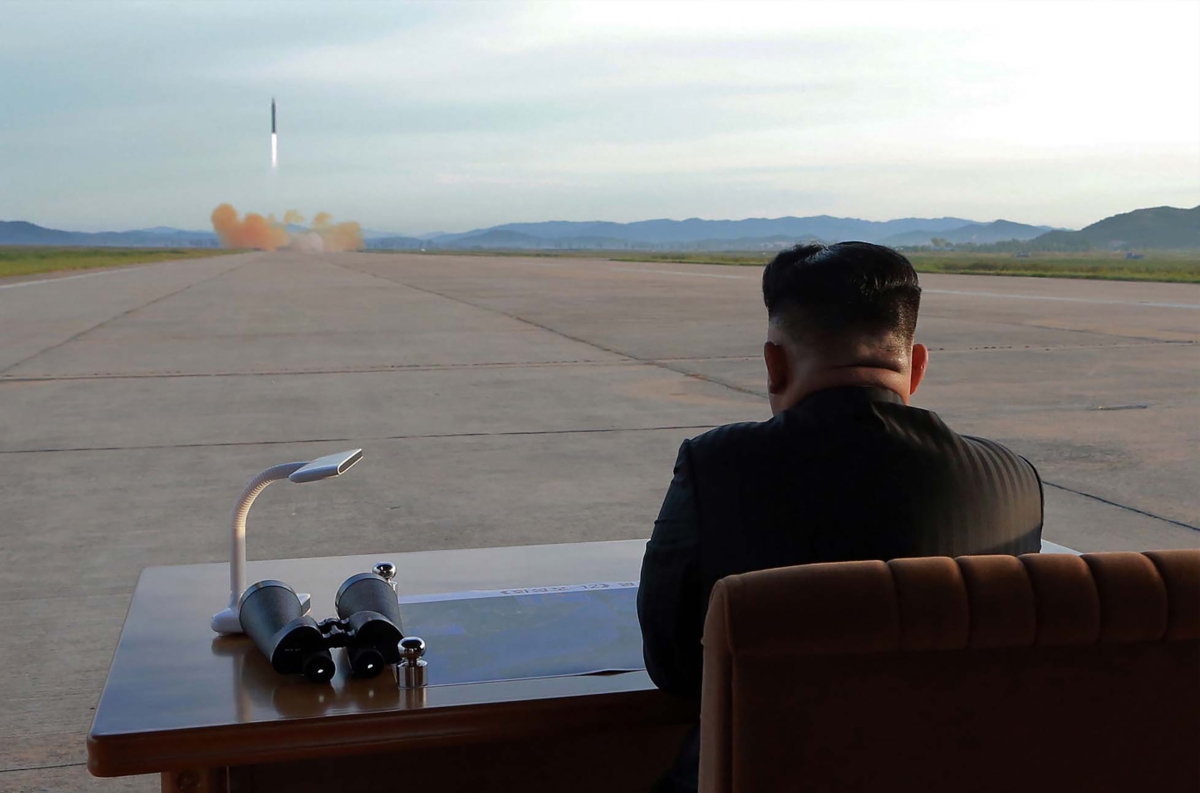North Korean leader Kim Jong-Un inspecting a launching drill of the medium-and-long range strategic ballistic rocket Hwasong-12