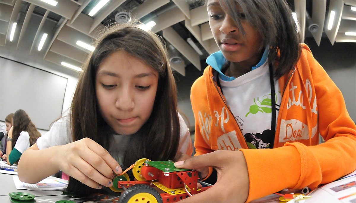 Two girls working on a STEM project