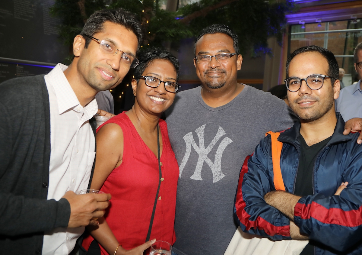 Friends pose at an Asia Society party. 