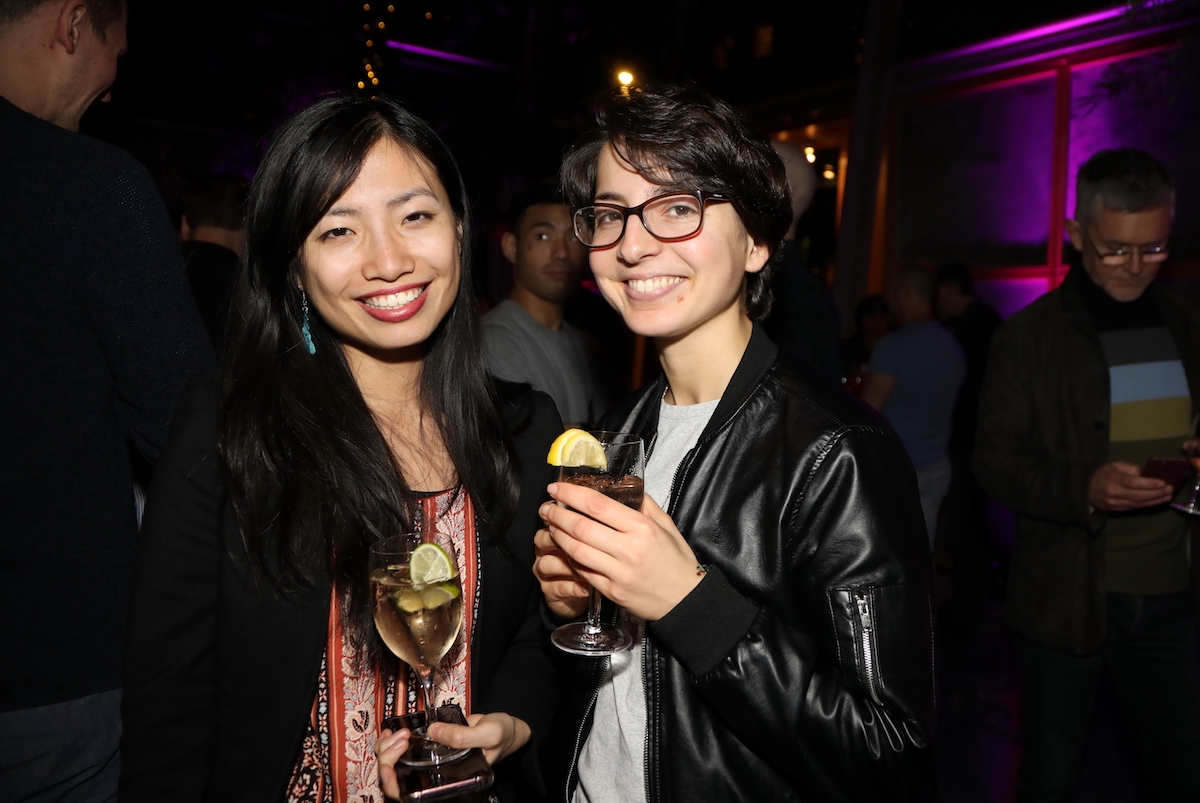 Friends smile for the camera at a Friday Leo Bar. (Ellen Wallop/Asia Society)