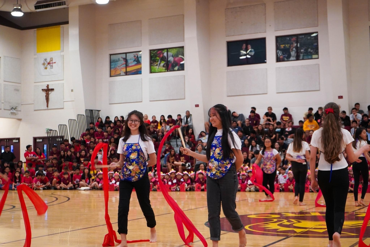 Chinese learners performing the rainbow dance in the Maryknoll Community Center on the Lunar New Year day