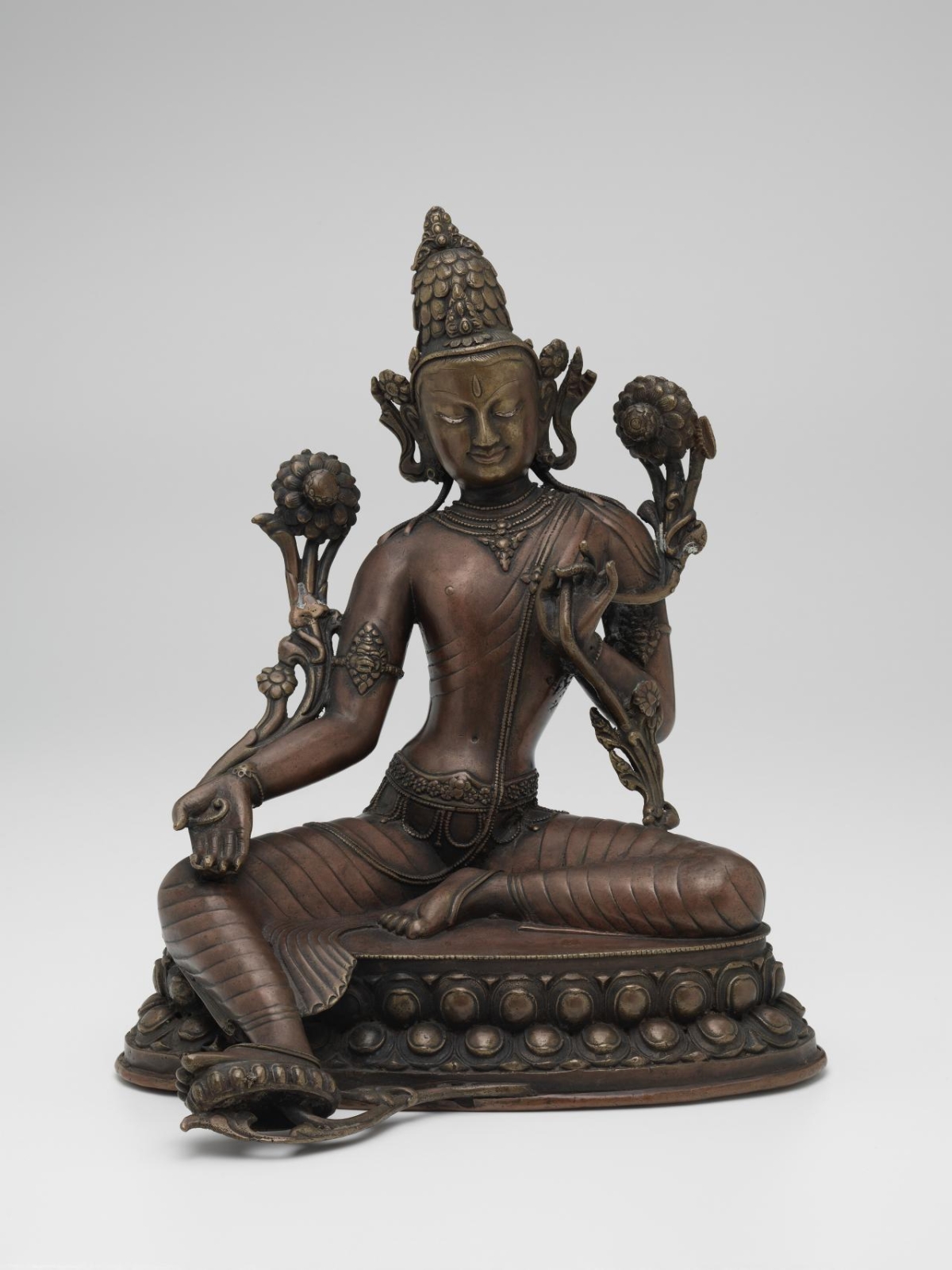 Nepalese Avalokiteshvara, 15th century copper alloy, silver, pigment, gilt 32.8 × 27.0 × 24.0 cm National Gallery of Victoria, Melbourne Purchased, 1975