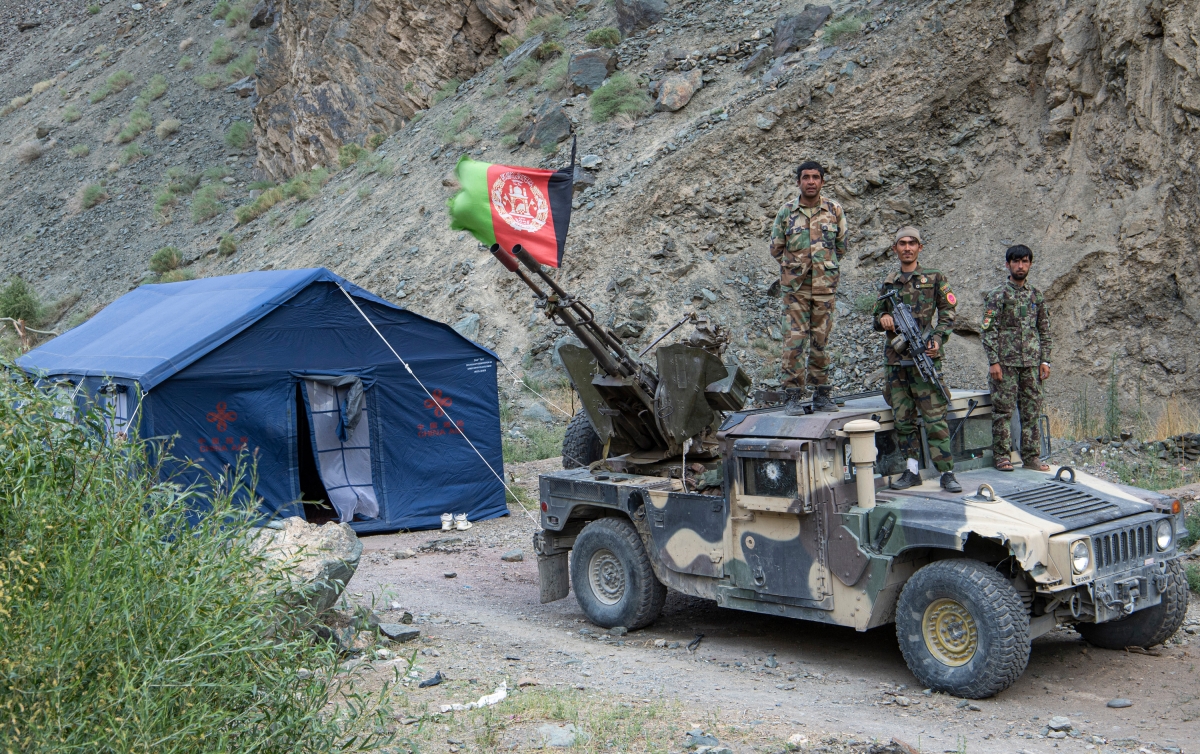 Afghan government forces spent their last months in power resisting incursions from the Taliban. In this photo, military police officers in Bamyan province pose for a picture in Du Ab village, located in the mountainous Shibar district some 65 miles northwest of Kabul on July 18, 2021, the day of a Taliban retreat.