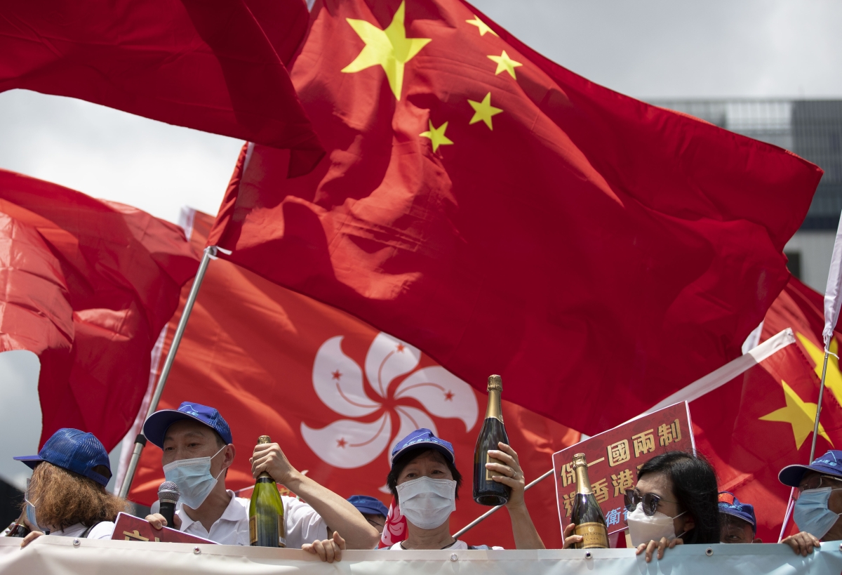 Pro-Beijing Hong Kongers celebrate the enactment of the National Security Law