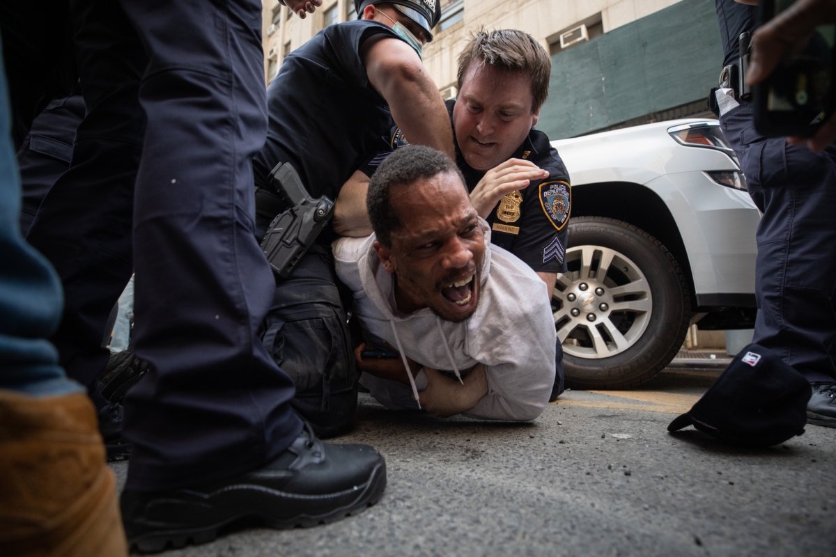 A man is detained by NYPD officers on May 29, 2020, during a protest near Foley Square in Manhattan. 