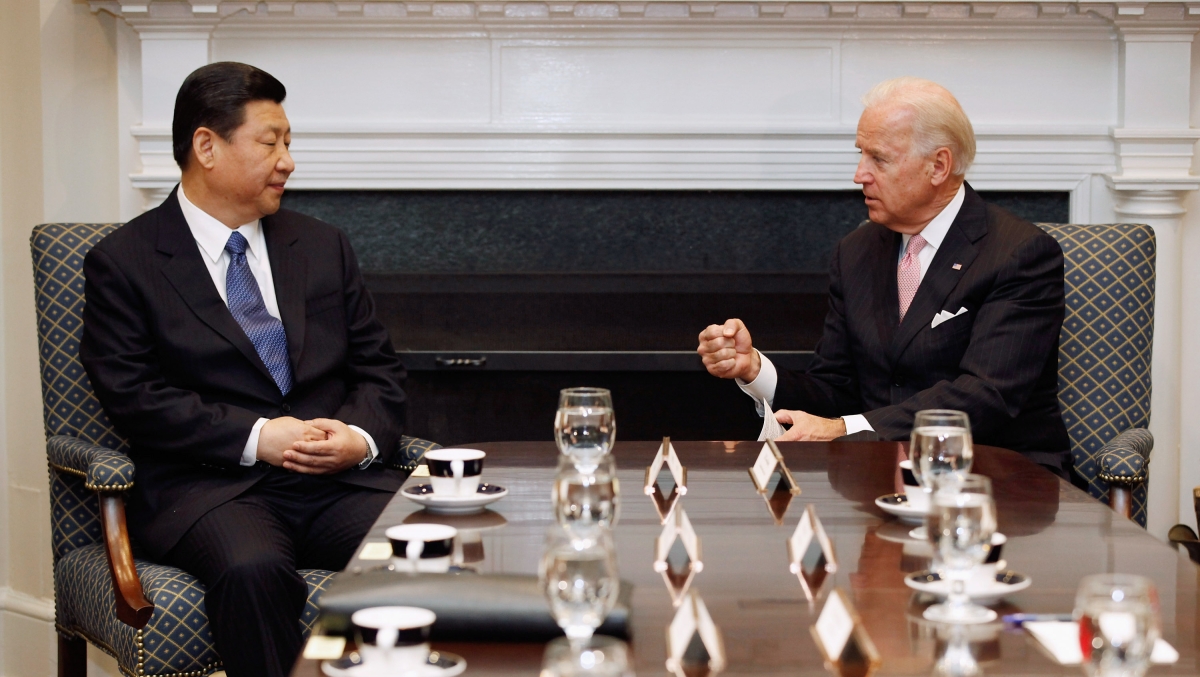 U.S. Vice President Joe Biden (R) and Chinese Vice President Xi Jinping talk during an expanded bilateral meeting with other U.S. and Chinese officials in the Roosevelt Room at the White House February 14, 2012 in Washington, DC. While in Washington, Vice President Xi will meet with Biden, President Barack Obama and other senior Administration officials to discuss a broad range of bilateral, regional, and global issues. 