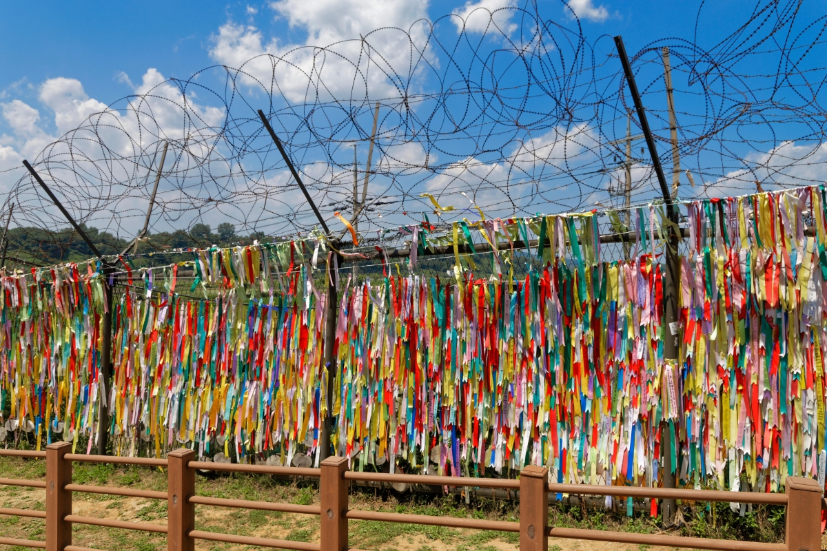 Messages of peace and unity left on a fence at at the so-called “Bridge of No Return” located at the Korean Demilitarized Zone, at Imjingak, South Korea.