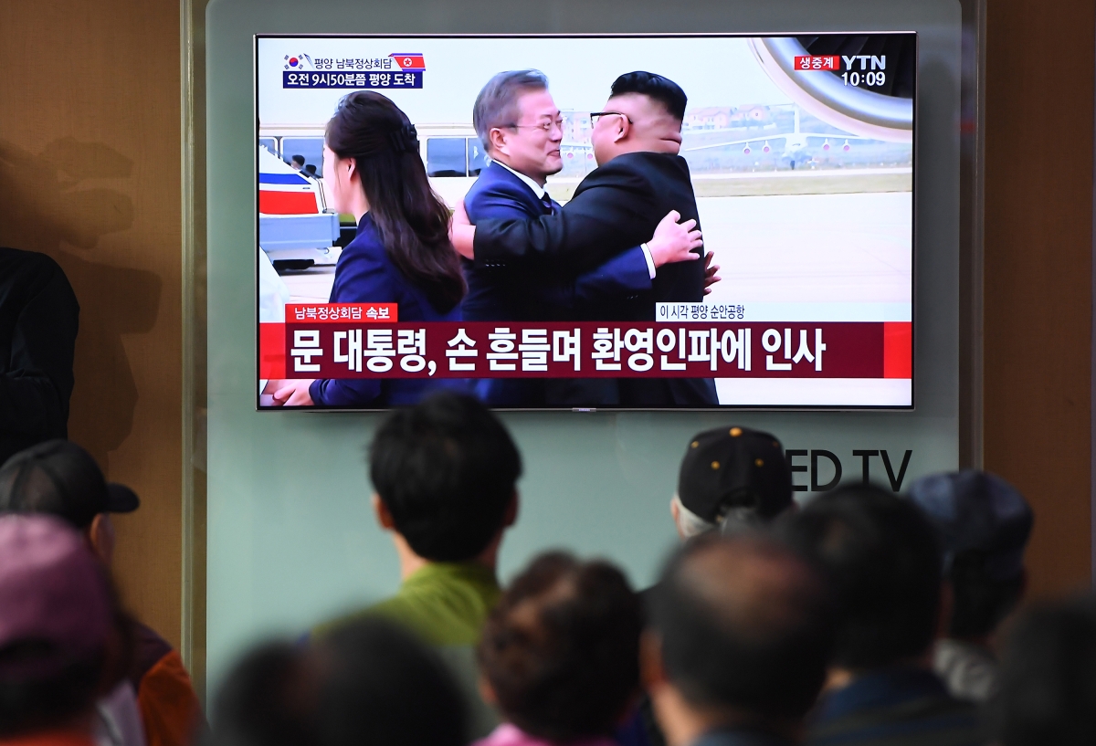 Moon Jae-in hugs Kim Jong Un
