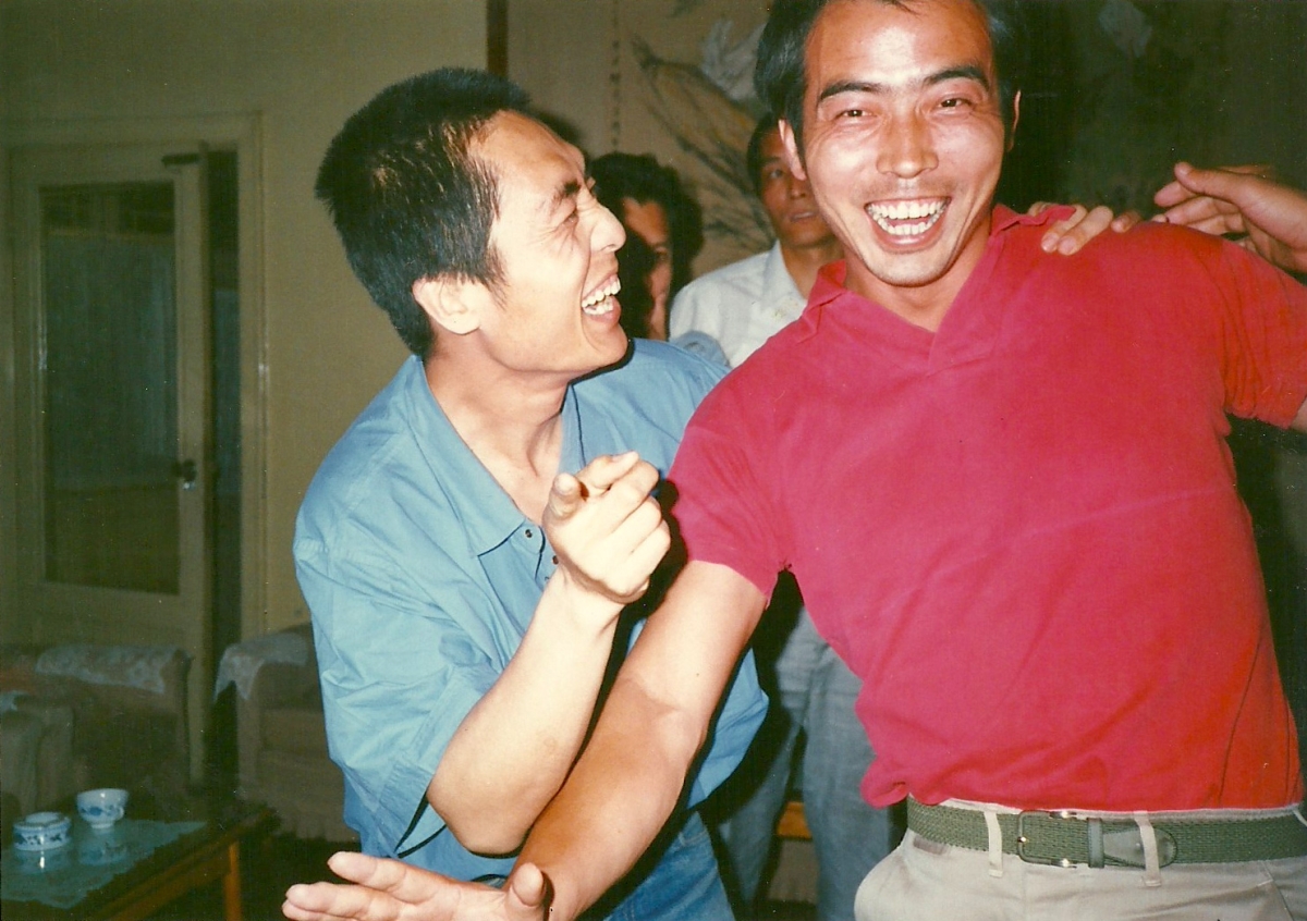 Celebrated Chinese film directors Zhang Yimou, left, and Chen Kaige share a laugh in Beijing in the 1980s.