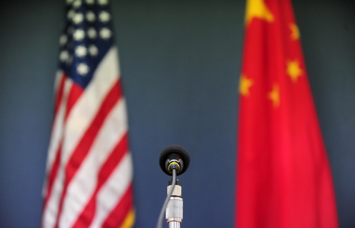 The US and China flags stand behind a microphone awaiting the arrival of US Senator John McCain, who was joined by Senators Lindsey Graham Amy Klobuchar for a press conference at the US Embassy in Beijing on April 9, 2009 during the China stop of the Congressional Delegation's fact-finding Asia-tour. Senator McCain said he urged Chinese officials in talks here to back a strong United Nations response to North Korea's rocket launch, but indicated China had resisted.