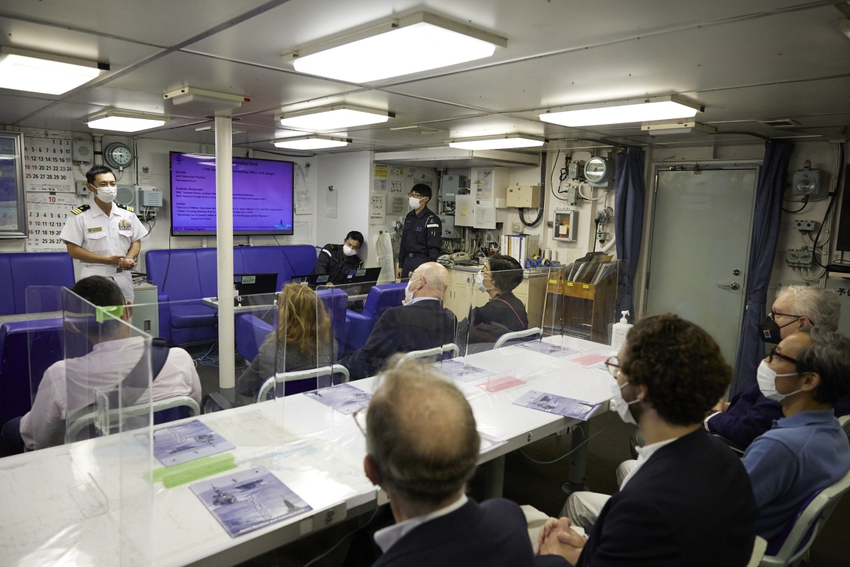 Commandar SAITO briefing the Founding Members onboard JMSDF Destroyer Amagiri