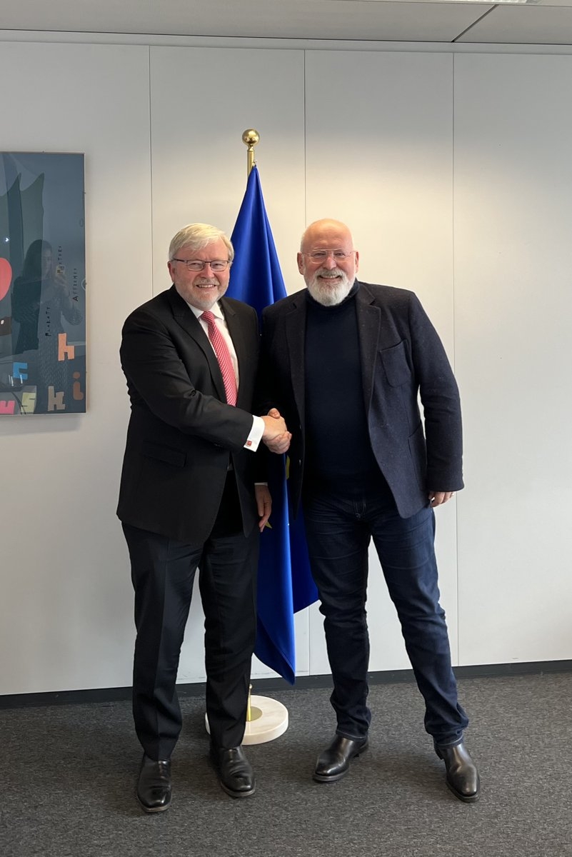 Kevin Rudd shakes hands with Vice President of the European Commission Frans Timmermans