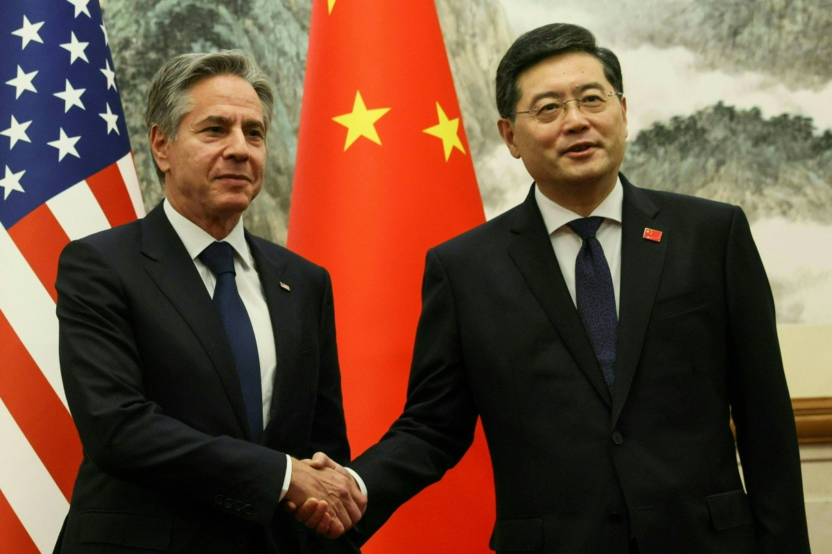 US Secretary of State Antony Blinken (L) and China's Foreign Minister Qin Gang shake hands ahead of a meeting at the Diaoyutai State Guesthouse in Beijing on June 18, 2023.