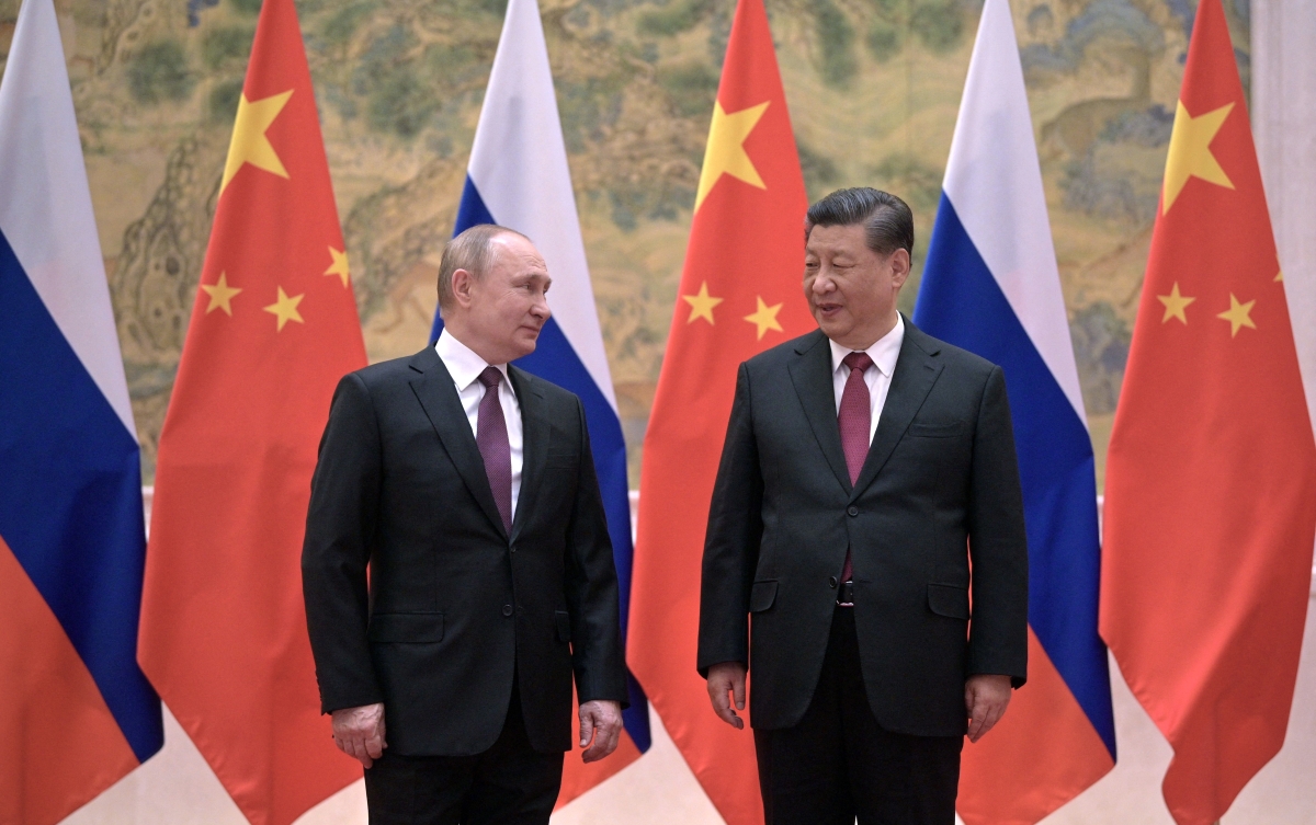 Russian President Vladimir Putin and Chinese President Xi Jinping pose during their meeting in Beijing in 2022 